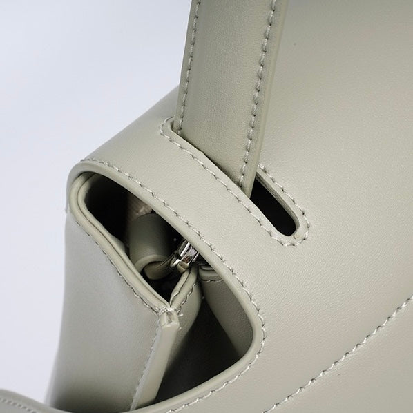 Women's Genuine Cowhide Minimalist Handheld Saddle Bag