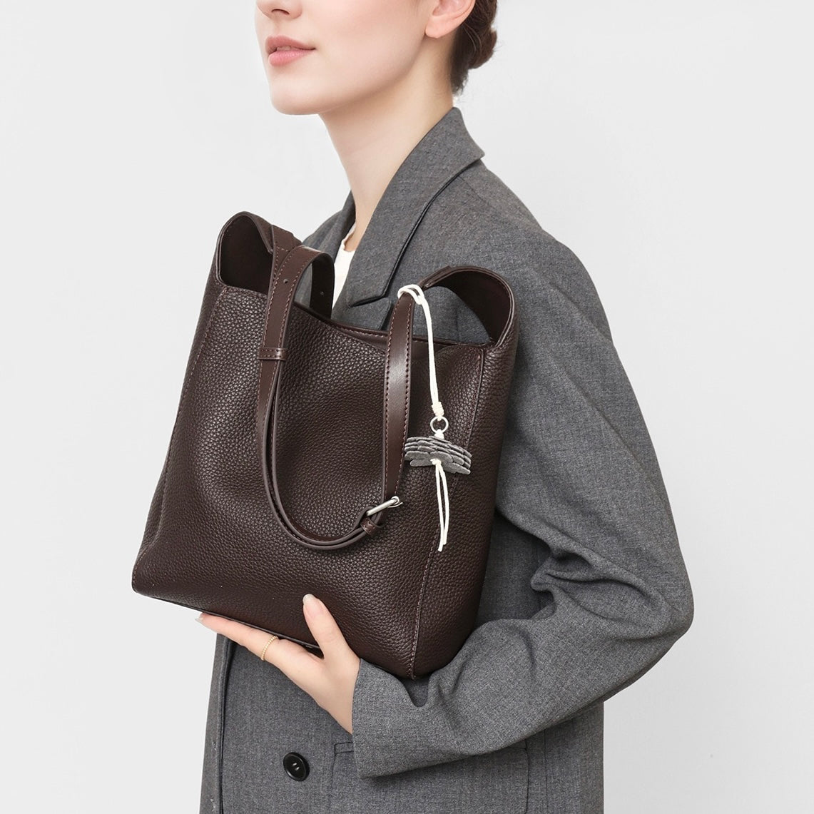 Textured Genuine Leather Hobo Bag with Floral Charm