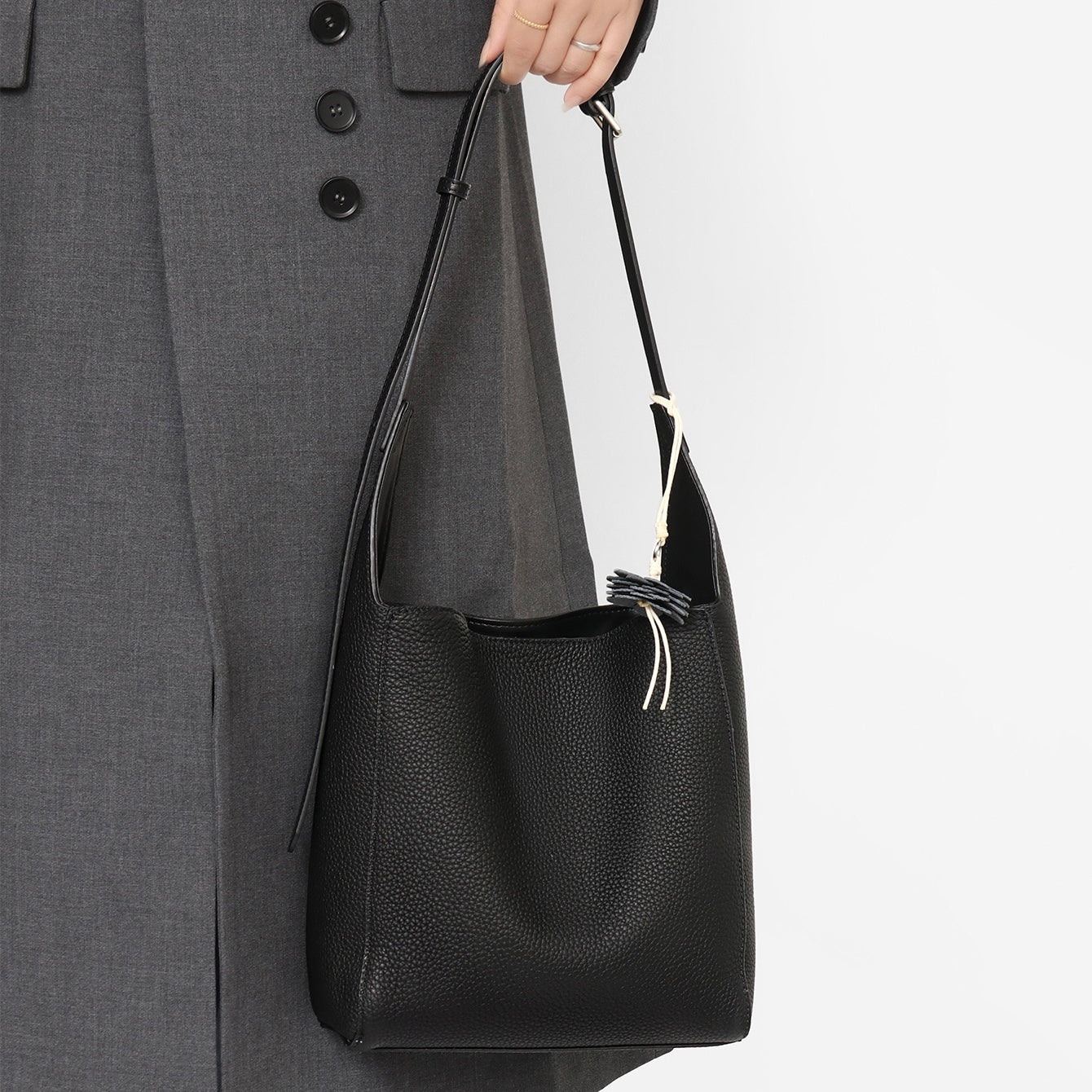 Textured Genuine Leather Hobo Bag with Floral Charm