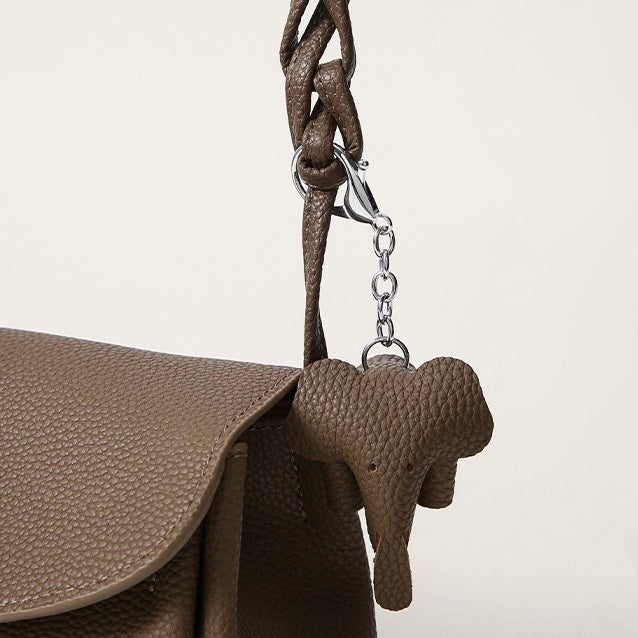 Exquisite Genuine Leather Crossbody Bag with Mini Elephant Pendant