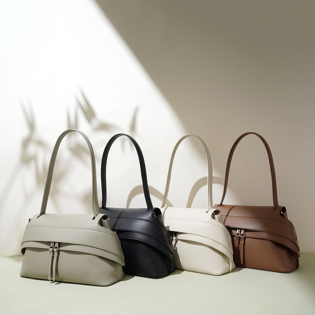 Women's Genuine Cowhide Minimalist Handheld Saddle Bag