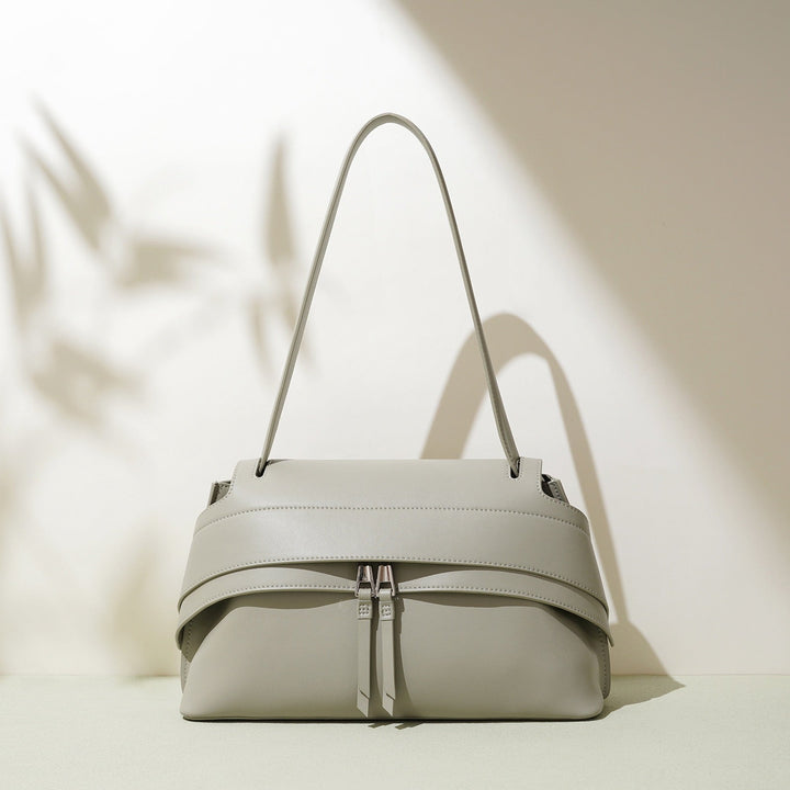 Women's Genuine Cowhide Minimalist Handheld Saddle Bag