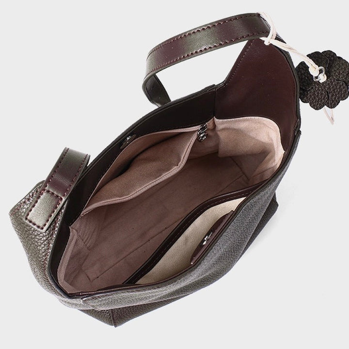 Textured Genuine Leather Hobo Bag with Floral Charm