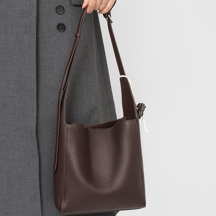 Textured Genuine Leather Hobo Bag with Floral Charm