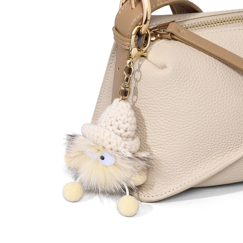 Elegant Geometric Genuine Leather Crossbody Bag with Plush Charm