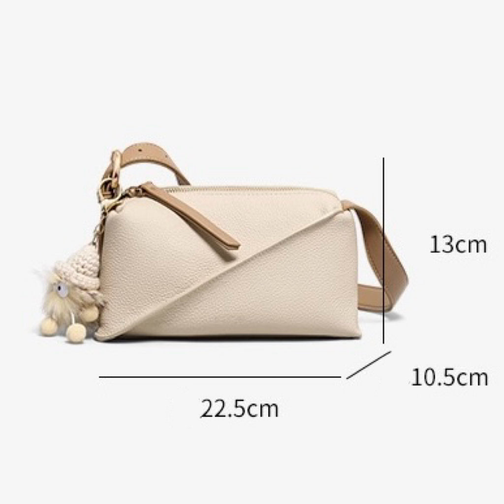 Elegant Geometric Genuine Leather Crossbody Bag with Plush Charm