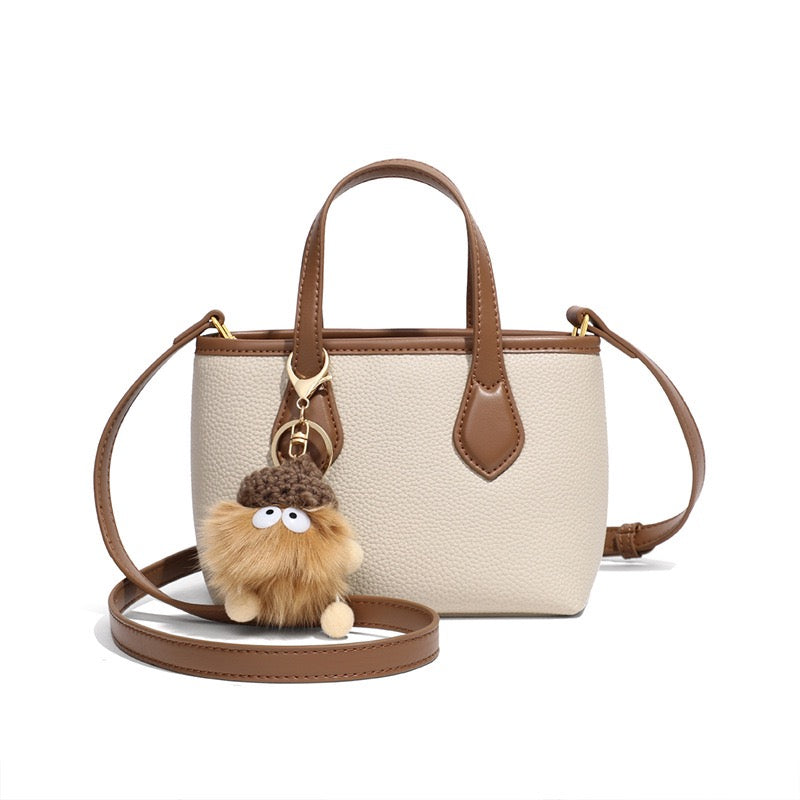 Women’s Genuine Leather Cute Mini Pom Pom Bucket Crossbody Handbag