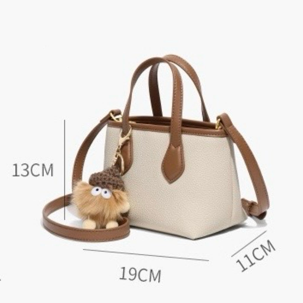 Women’s Genuine Leather Cute Mini Pom Pom Bucket Crossbody Handbag
