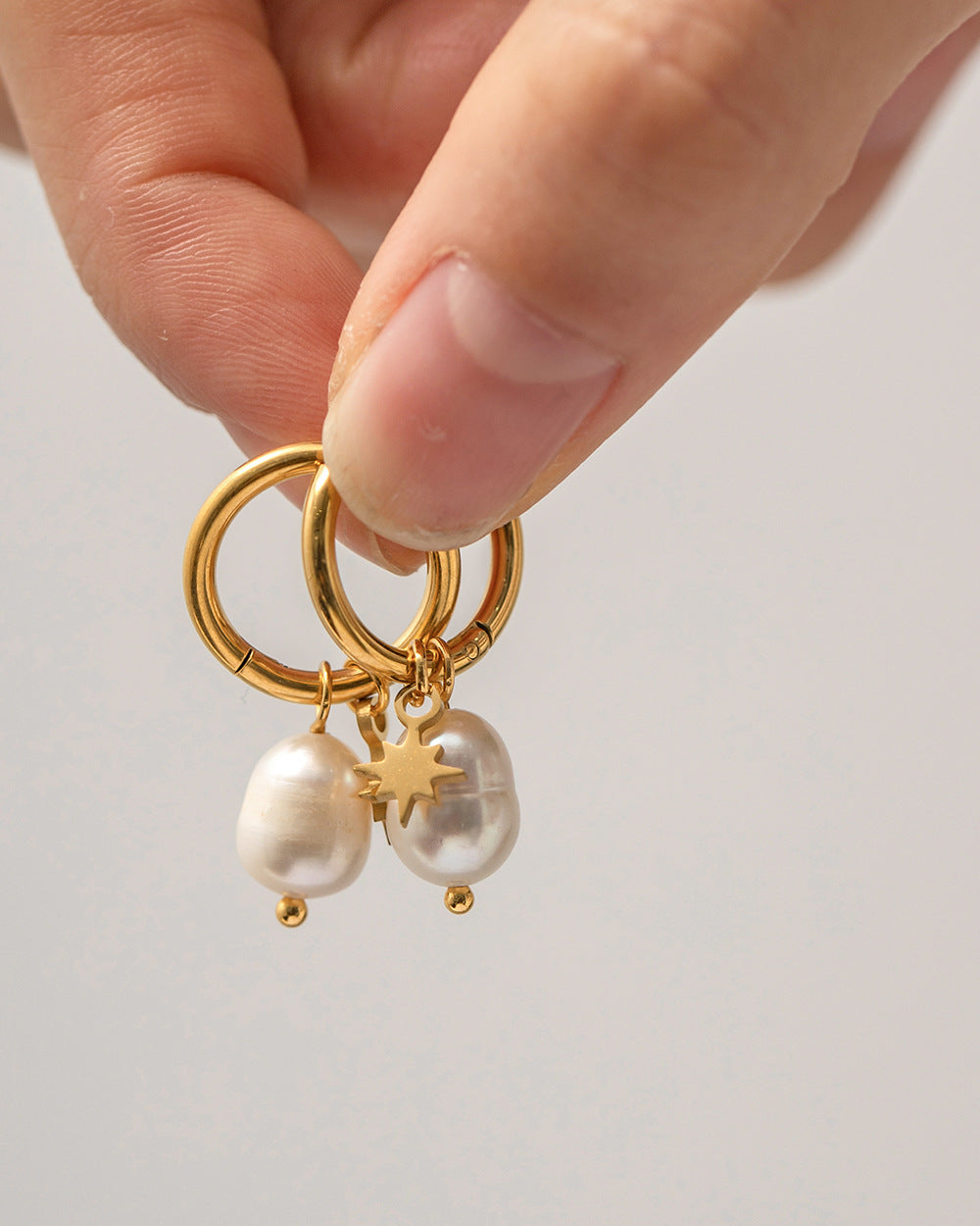 Natural Freshwater Pearl Earrings with Star Pendants